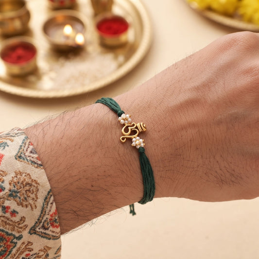 Antique Om Pearl Rakhi Green