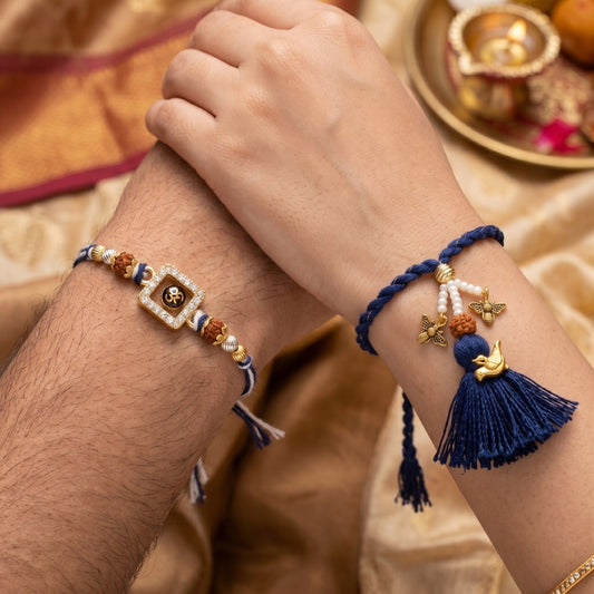 Om Divine Crystal & Royal Blue Rudraksha Bird Tassel Lumba Rakhi Set of 2