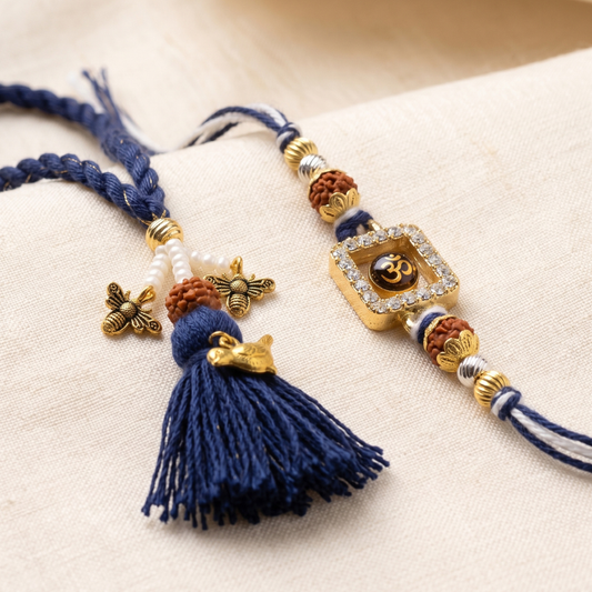 Om Divine Crystal & Royal Blue Rudraksha Bird Tassel Lumba Rakhi Set of 2