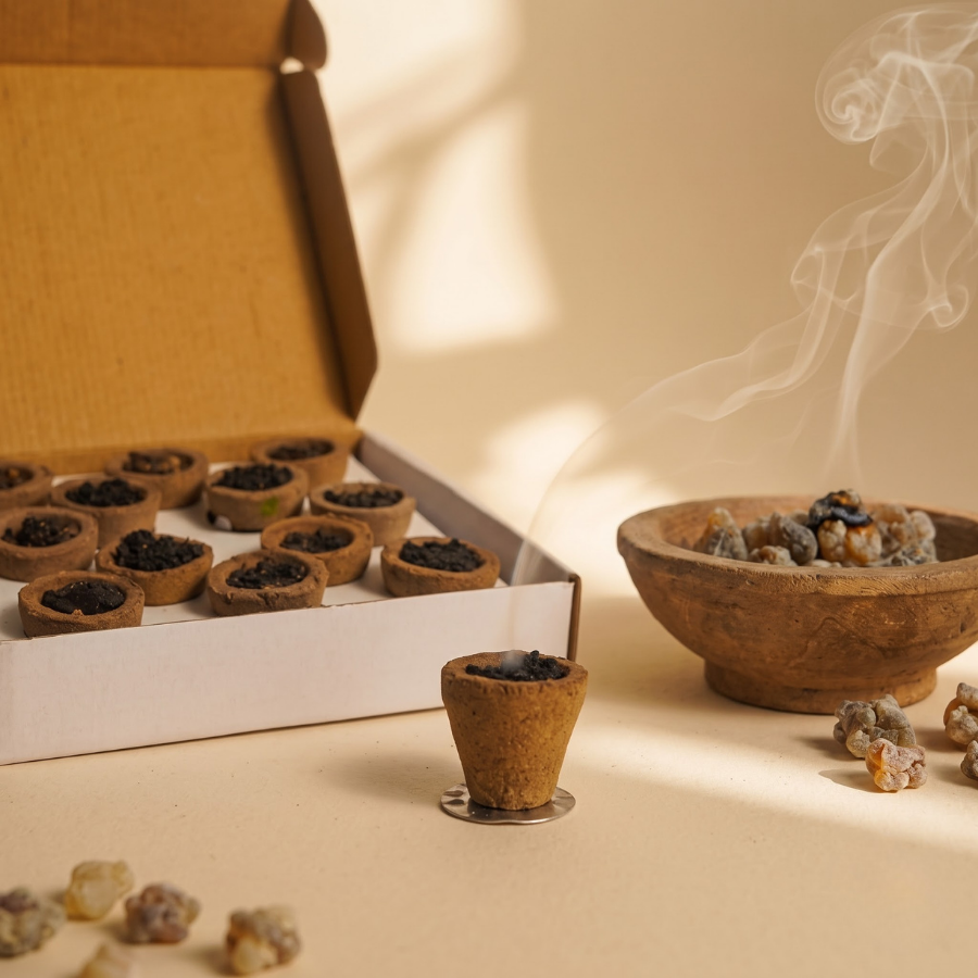 Sambrani Dhoop Cups Terracotta, lit with smoke